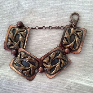 Vintage copper bracelet with four sections.  J0148